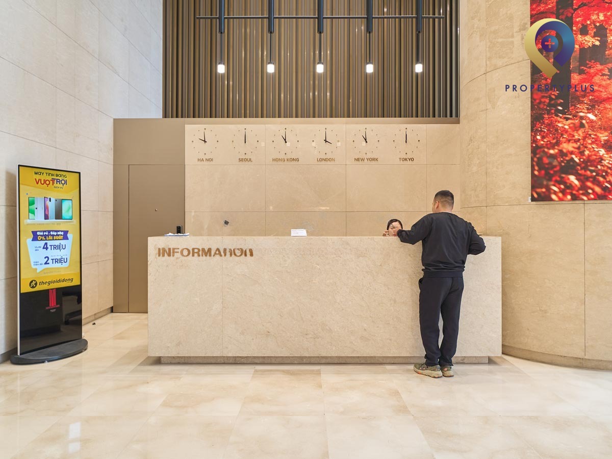 Reception desk with staff at Lotte Center Hanoi lobby - hình ảnh từ Property Plus